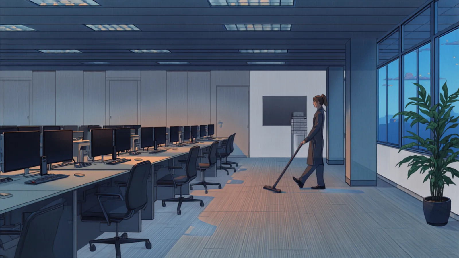 An open plan office at dusk with a cleaner running a vacuum between desk banks - commercial cleaning cost sydney